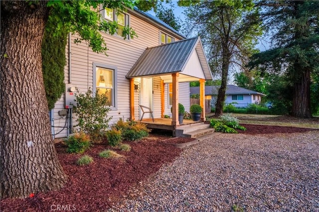 1711 Shasta St, Anderson, CA 96007 - view of front facade featuring covered porch and a metal roof