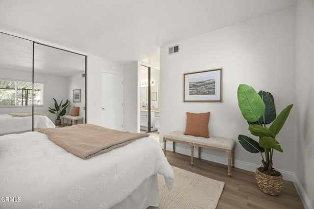 5217 Hillridge Dr, Camarillo, CA 93012 - bedroom featuring wood finished floors and ensuite bathroom