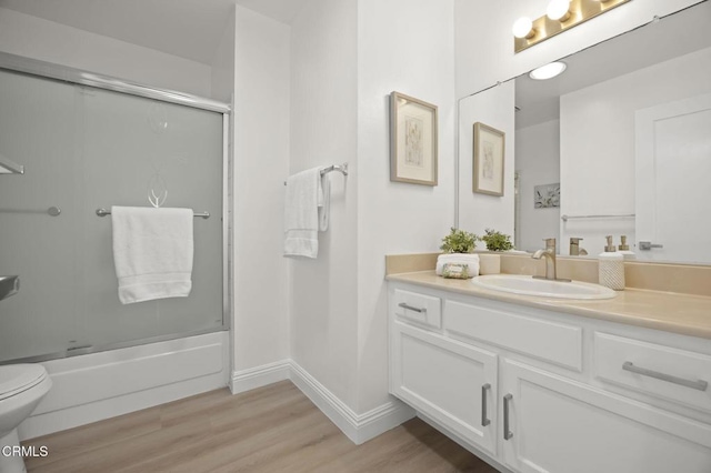 5217 Hillridge Dr, Camarillo, CA 93012 - full bath with vanity, wood finished floors, and enclosed tub / shower combo
