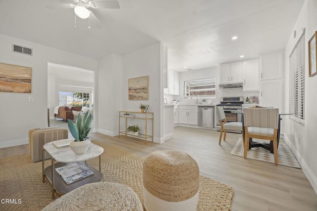 5217 Hillridge Dr, Camarillo, CA 93012 - living area featuring light wood-type flooring, a ceiling fan, and recessed lighting