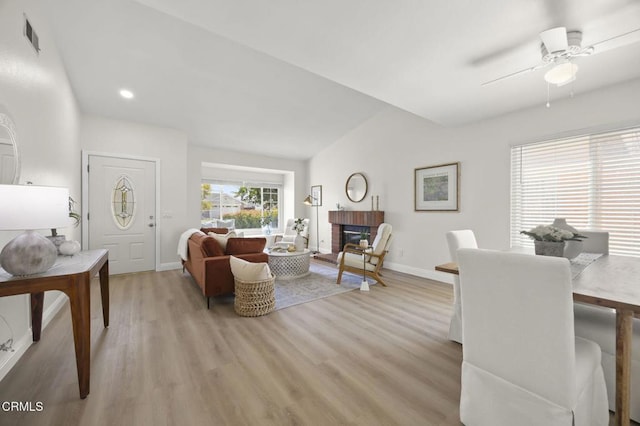 5217 Hillridge Dr, Camarillo, CA 93012 - living room with light wood-type flooring, a brick fireplace, ceiling fan, and recessed lighting