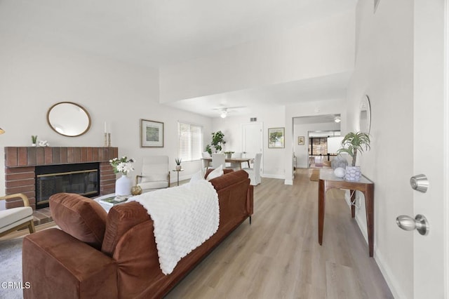 5217 Hillridge Dr, Camarillo, CA 93012 - living room featuring light wood-type flooring, a fireplace, and ceiling fan