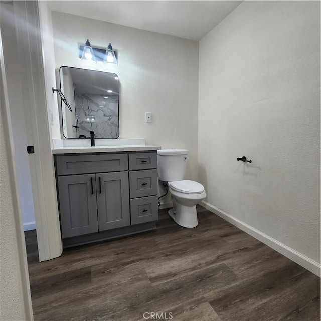 3087 N Lugo Ave, San Bernardino, CA 92404 - bathroom featuring wood finished floors and vanity
