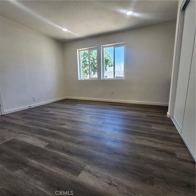 3087 N Lugo Ave, San Bernardino, CA 92404 - spare room featuring recessed lighting and dark wood-type flooring