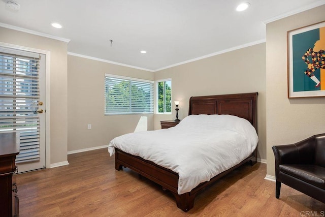 1560 Circa Del Lago Unit D204, San Marcos, CA 92078 - bedroom with wood finished floors, crown molding, and recessed lighting