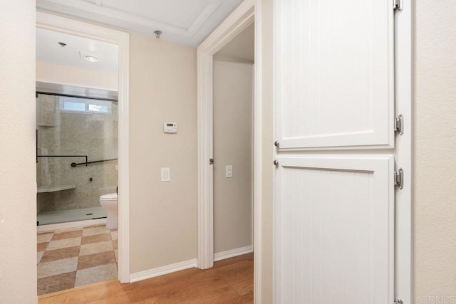 1560 Circa Del Lago Unit D204, San Marcos, CA 92078 - corridor featuring wood finished floors and baseboards