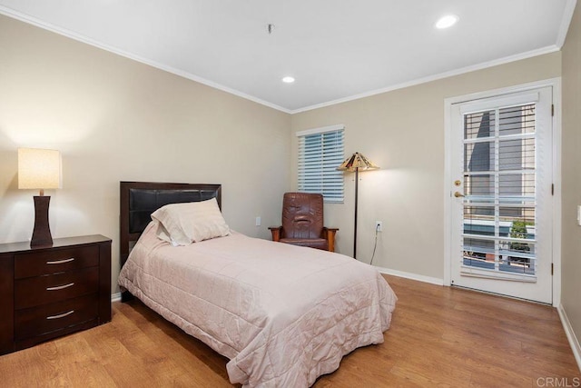 1560 Circa Del Lago Unit D204, San Marcos, CA 92078 - bedroom with light wood finished floors, ornamental molding, and recessed lighting