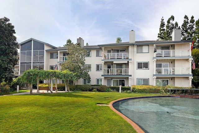 1560 Circa Del Lago Unit D204, San Marcos, CA 92078 - view of pool featuring a lawn