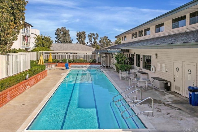 1560 Circa Del Lago Unit D204, San Marcos, CA 92078 - community pool with a fenced backyard and a patio area