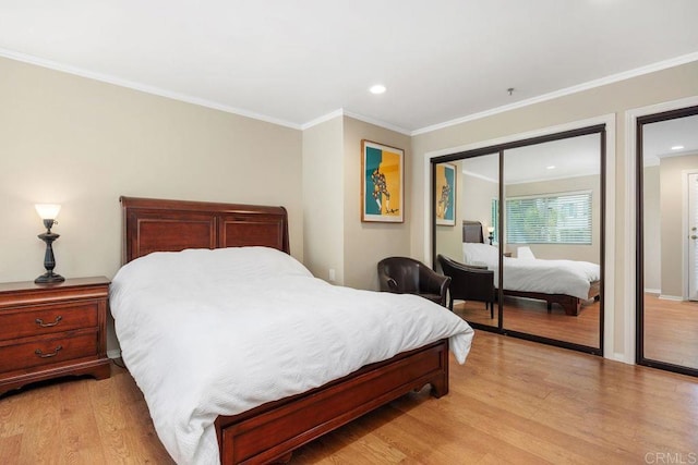 1560 Circa Del Lago Unit D204, San Marcos, CA 92078 - bedroom featuring light wood-type flooring, ornamental molding, a closet, and recessed lighting