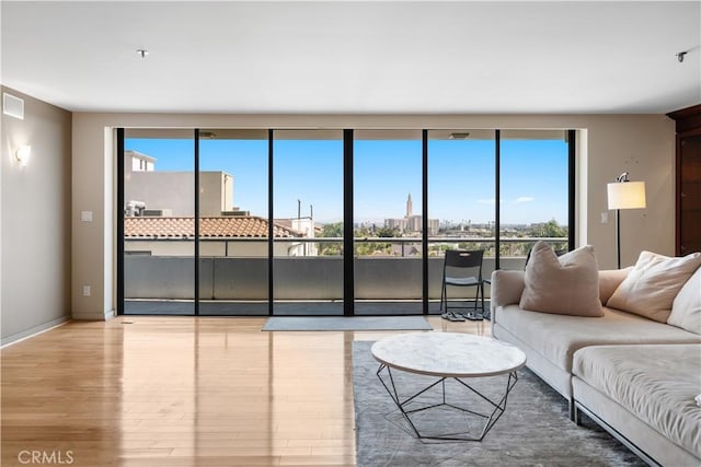 10660 Wilshire Blvd Unit 609, Los Angeles, CA 90024 - living area featuring wood finished floors and baseboards