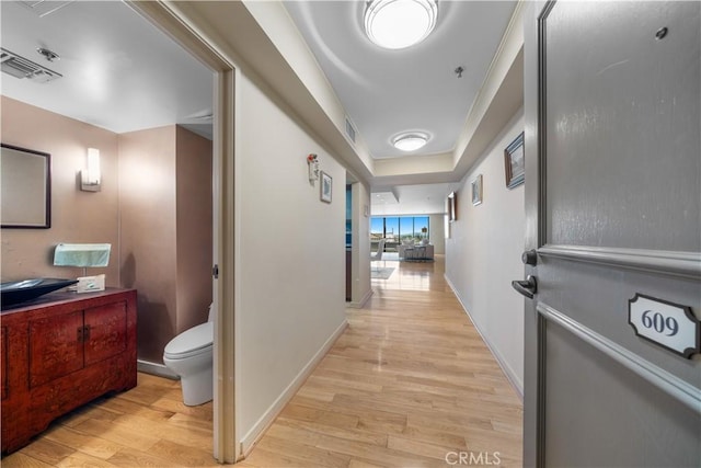 10660 Wilshire Blvd Unit 609, Los Angeles, CA 90024 - corridor with light wood-type flooring and baseboards
