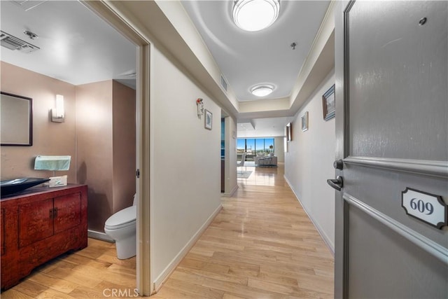 10660 Wilshire Blvd Unit 609, Los Angeles, CA 90024 - hall featuring light wood-type flooring and baseboards