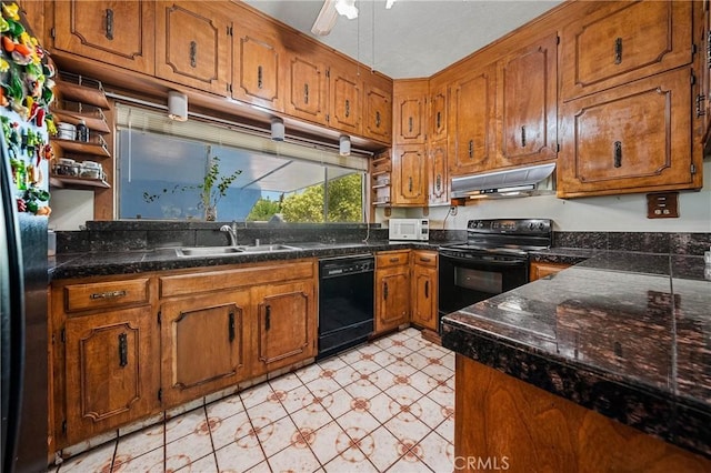 16374 35th Ave Unit 2, Clearlake, CA 95422 - kitchen with black appliances, under cabinet range hood, brown cabinetry, open shelves, and dark countertops