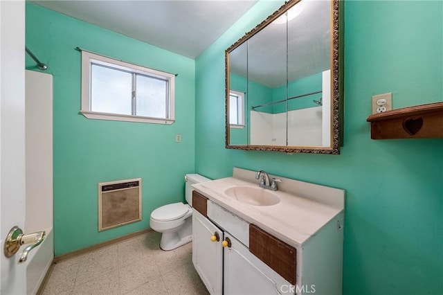16374 35th Ave Unit 2, Clearlake, CA 95422 - bathroom featuring heating unit, vanity, a shower, and tile patterned floors