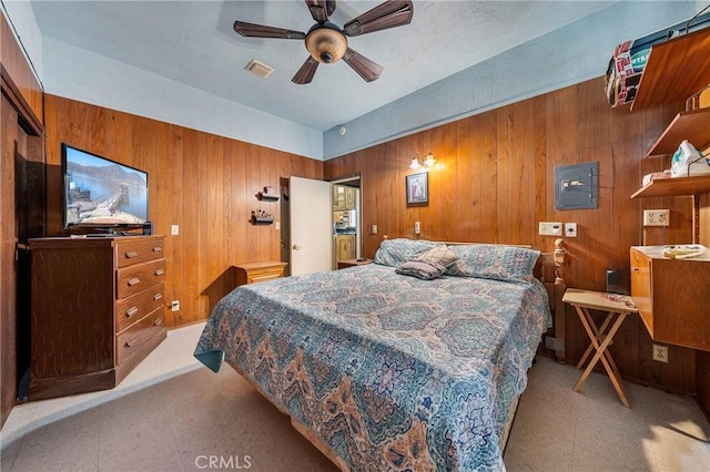 16374 35th Ave Unit 2, Clearlake, CA 95422 - bedroom with wooden walls and tile patterned floors