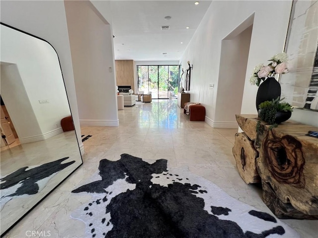 16815 Bajio Rd, Encino, CA 91436 - corridor featuring baseboards and light marble finish floors