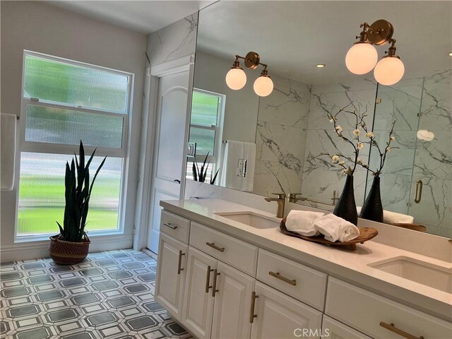 16815 Bajio Rd, Encino, CA 91436 - full bathroom with double vanity and a marble finish shower