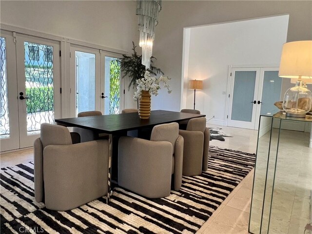 16815 Bajio Rd, Encino, CA 91436 - dining space featuring french doors, plenty of natural light, and a towering ceiling