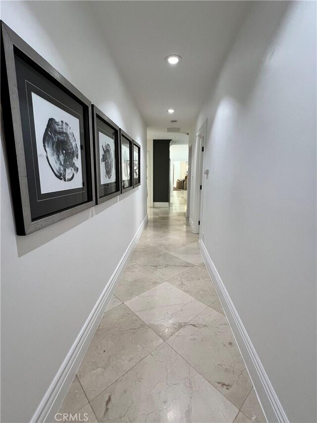 16815 Bajio Rd, Encino, CA 91436 - corridor with light marble finish flooring and recessed lighting