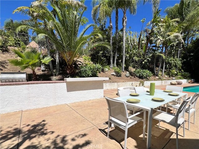 16815 Bajio Rd, Encino, CA 91436 - view of patio with outdoor dining area and an outdoor pool