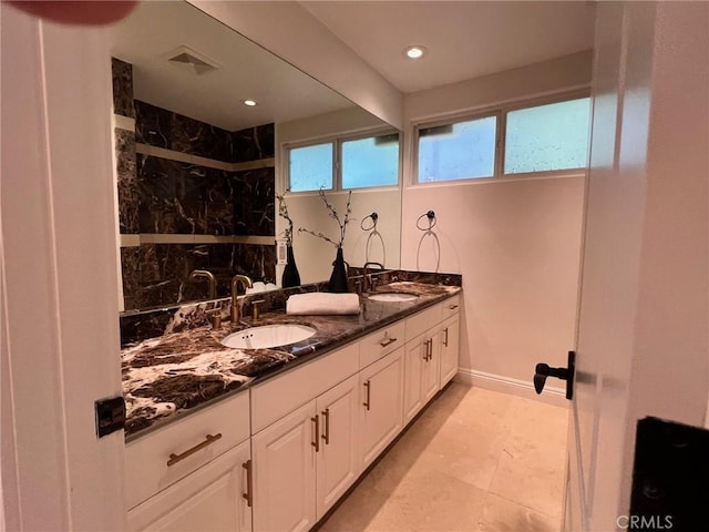 16815 Bajio Rd, Encino, CA 91436 - bathroom featuring double vanity, a marble finish shower, and recessed lighting