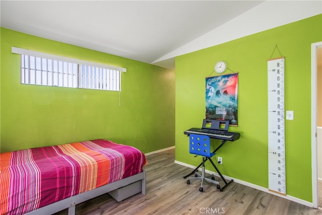 25545 Prospect Ave, Loma Linda, CA 92354 - bedroom featuring vaulted ceiling and wood finished floors