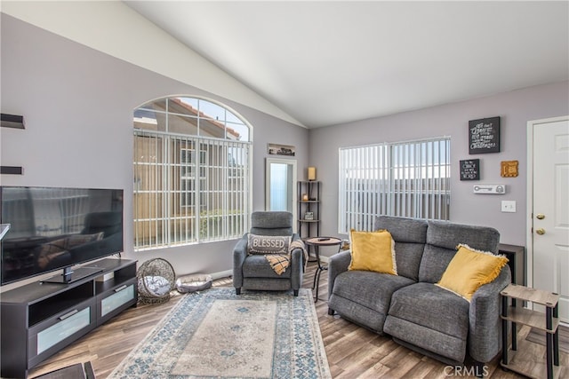 25545 Prospect Ave, Loma Linda, CA 92354 - living room with vaulted ceiling and wood finished floors