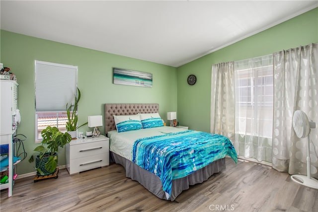 25545 Prospect Ave, Loma Linda, CA 92354 - bedroom featuring wood finished floors and ornamental molding