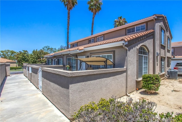25545 Prospect Ave, Loma Linda, CA 92354 - view of front of house with a tile roof and stucco siding