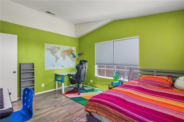 25545 Prospect Ave, Loma Linda, CA 92354 - bedroom with wood finished floors and vaulted ceiling