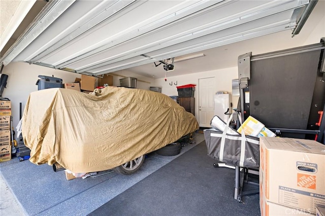 571 E Alru Ave, Rialto, CA 92376 - garage featuring a garage door opener
