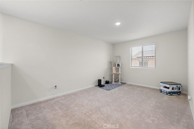 571 E Alru Ave, Rialto, CA 92376 - carpeted empty room featuring baseboards