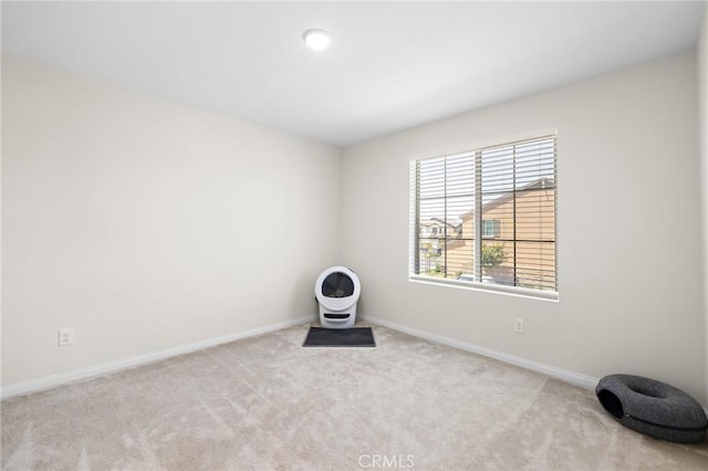 571 E Alru Ave, Rialto, CA 92376 - empty room featuring carpet floors and baseboards