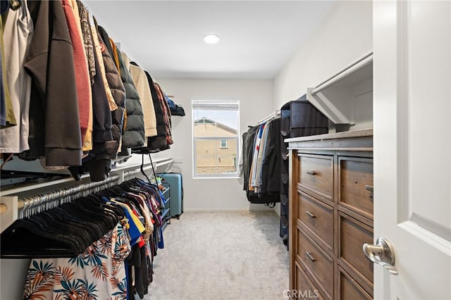 571 E Alru Ave, Rialto, CA 92376 - walk in closet featuring light carpet