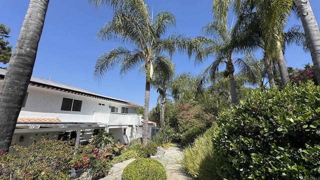 15696 Oakstand Rd, Poway, CA 92064 - view of home's exterior with roof mounted solar panels and stucco siding