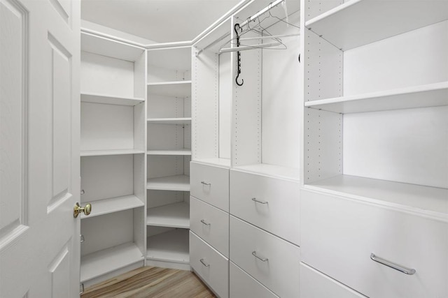 15696 Oakstand Rd, Poway, CA 92064 - walk in closet with light wood finished floors