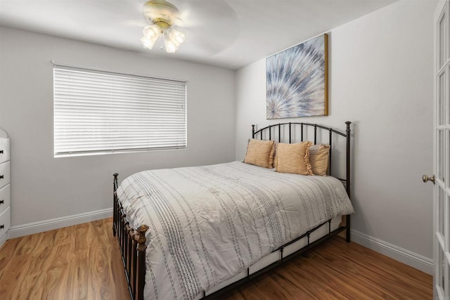 15696 Oakstand Rd, Poway, CA 92064 - bedroom featuring baseboards and wood finished floors