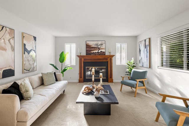 15696 Oakstand Rd, Poway, CA 92064 - living area featuring healthy amount of natural light, light colored carpet, and a glass covered fireplace