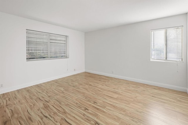 15696 Oakstand Rd, Poway, CA 92064 - empty room with light wood-type flooring and baseboards