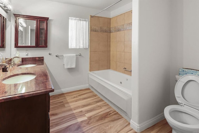 15696 Oakstand Rd, Poway, CA 92064 - full bath featuring shower / bath combination, double vanity, and wood finished floors
