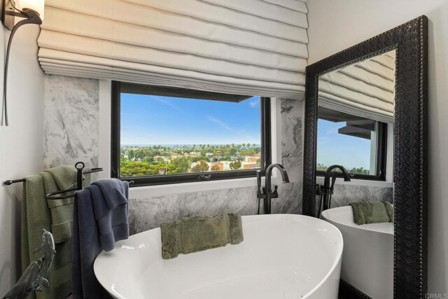 7133 Linden, Carlsbad, CA 92011 - full bath with a freestanding bath and a sink