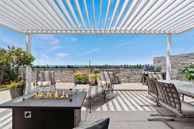7133 Linden, Carlsbad, CA 92011 - view of patio featuring a fire pit, a pergola, and outdoor dining space