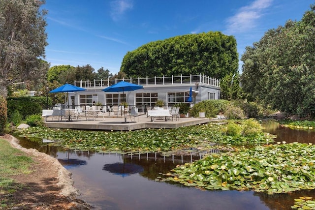 7133 Linden, Carlsbad, CA 92011 - rear view of property featuring a deck with water view