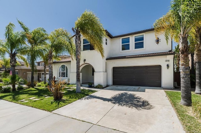 33740 Sattui St, Temecula, CA 92592 - mediterranean / spanish-style home featuring a tile roof, stucco siding, an attached garage, and concrete driveway