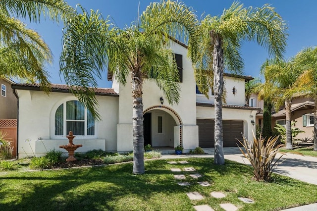 33740 Sattui St, Temecula, CA 92592 - mediterranean / spanish-style house with a garage, concrete driveway, a front lawn, and stucco siding