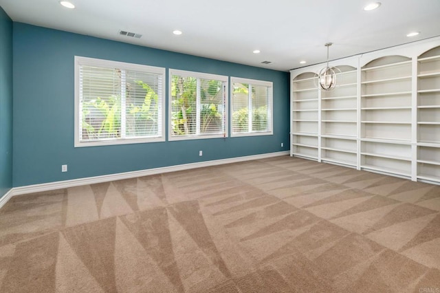 33740 Sattui St, Temecula, CA 92592 - spare room with recessed lighting, carpet, a chandelier, and built in shelves