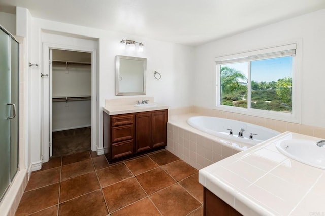 33740 Sattui St, Temecula, CA 92592 - bathroom with vanity, a stall shower, a bath, and tile patterned flooring