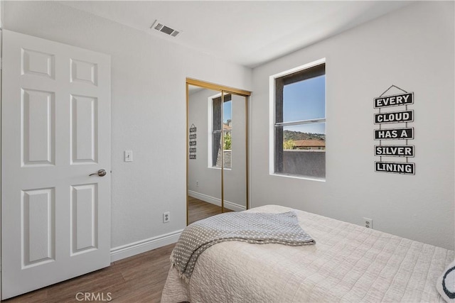 34 Carmel Ct, Laguna Beach, CA 92651 - bedroom featuring wood finished floors and a closet