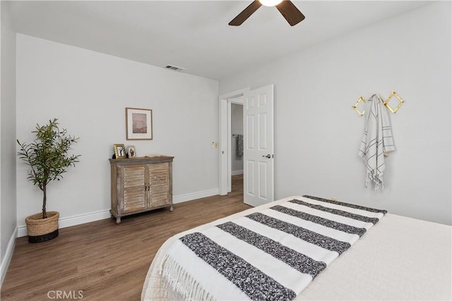 34 Carmel Ct, Laguna Beach, CA 92651 - bedroom with wood finished floors and a ceiling fan